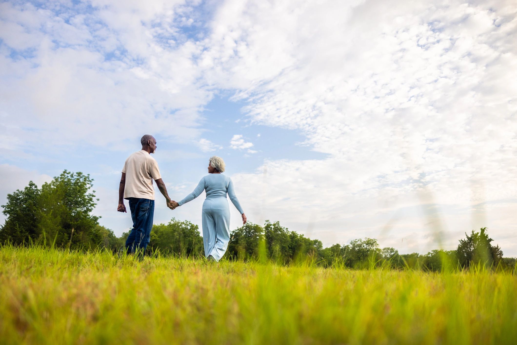 Retired couple enjoying an active outdoor lifestyle