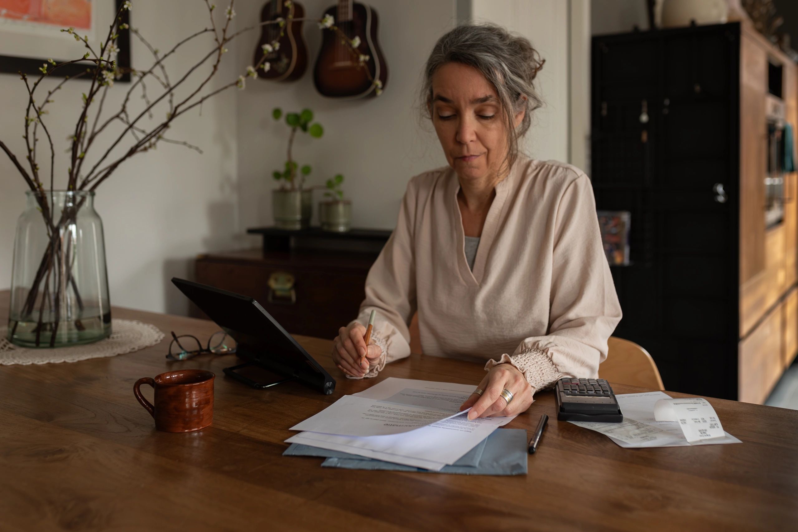 Person reviewing tax documents at home
