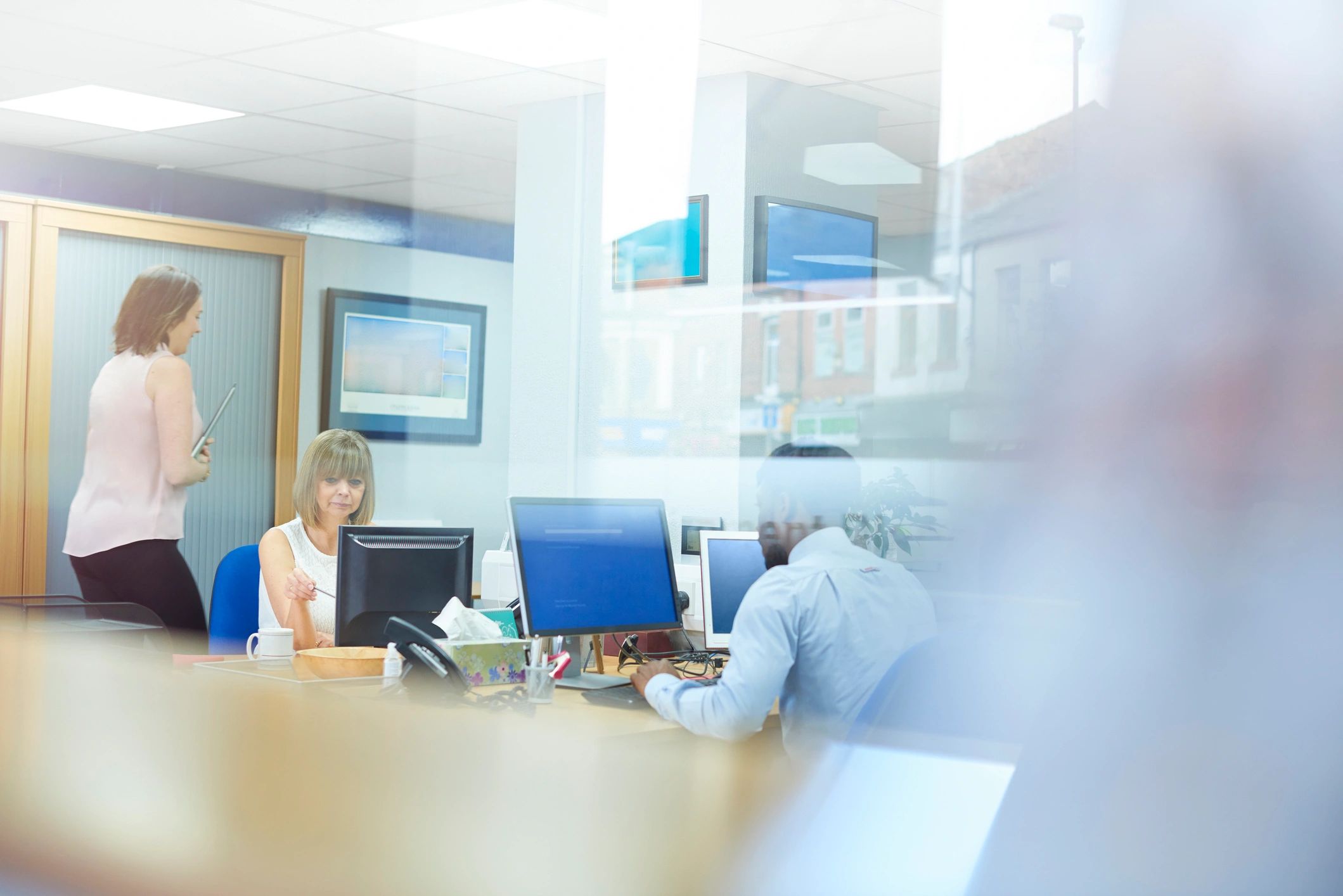 Financial content team working together in an office